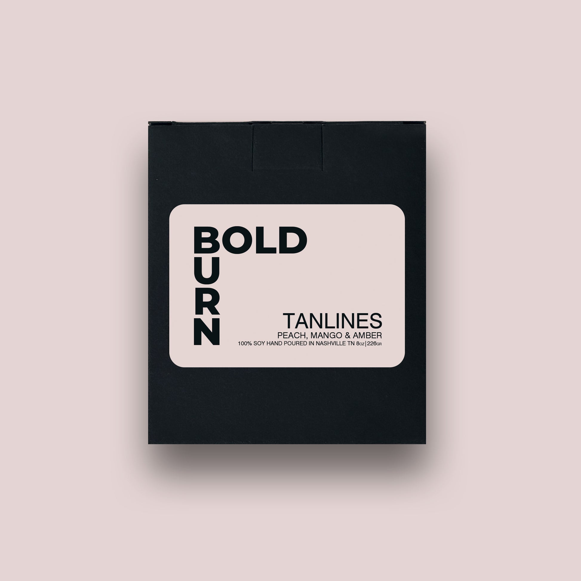 Bold Burn Tanlines black gift box with white label containing Bold Burn logo and product title